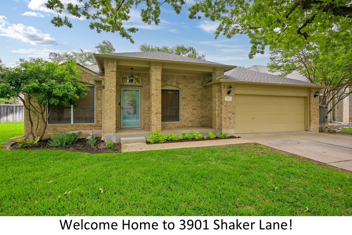 front view of a house with a yard