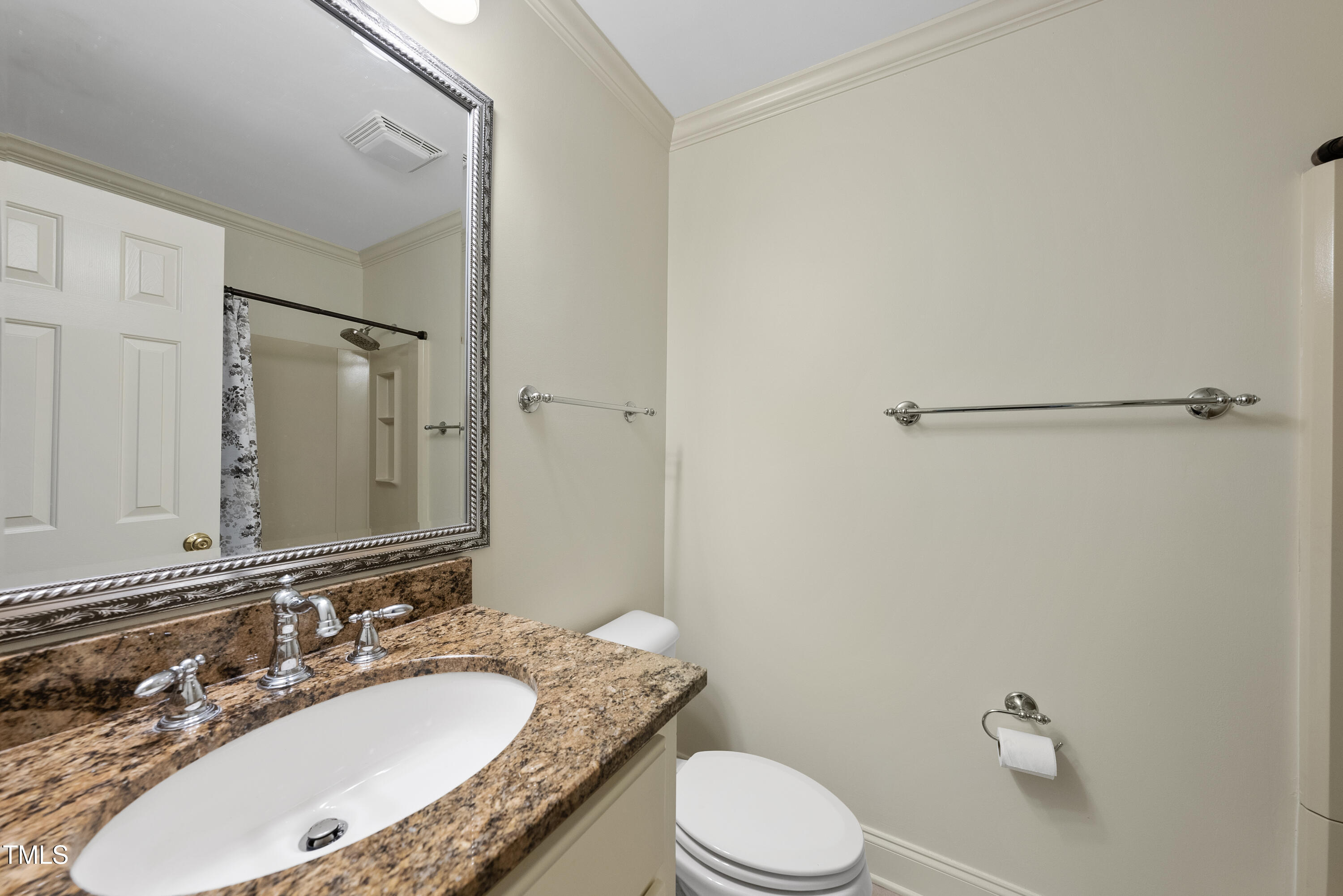 1403 Governors Court Raleigh, NC 27604 - Photo 16 of 34 a bathroom with a granite countertop sink toilet and shower
