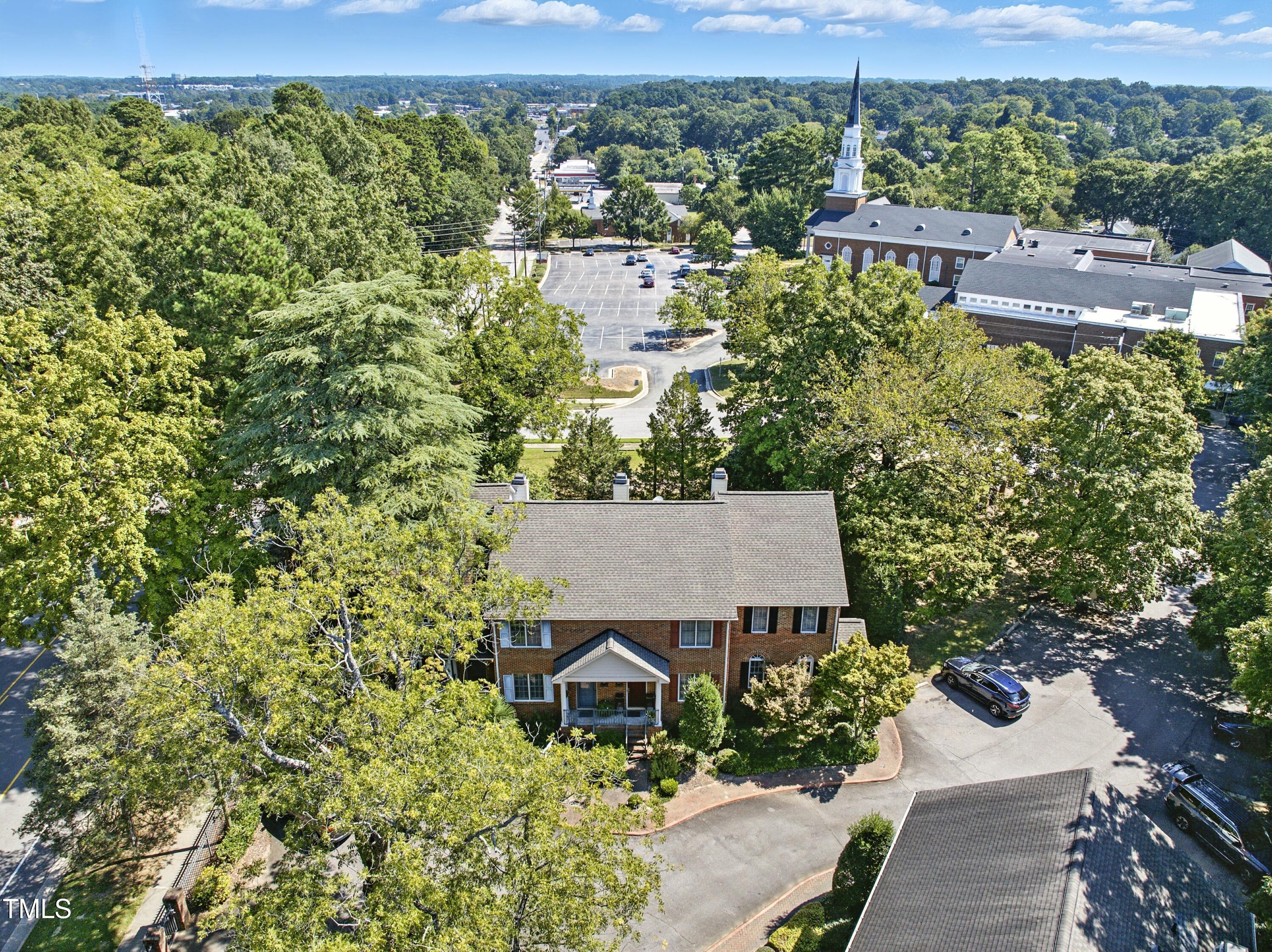 1403 Governors Court Raleigh, NC 27604 - Photo 23 of 34 an aerial view of a house with yard and outdoor seating