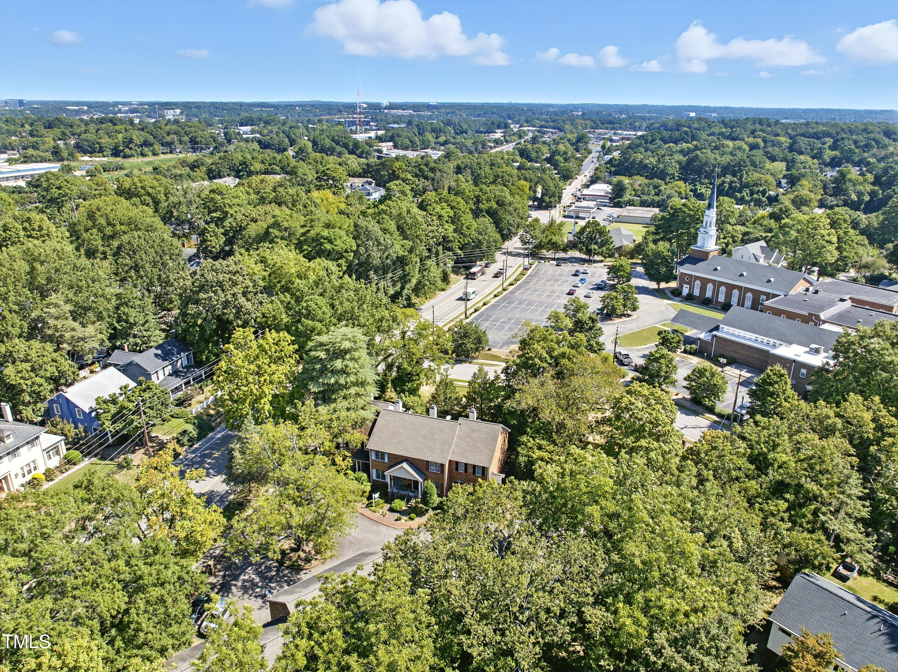 1403 Governors Court Raleigh, NC 27604 - Photo 24 of 34 an aerial view of residential house with outdoor space and trees all around