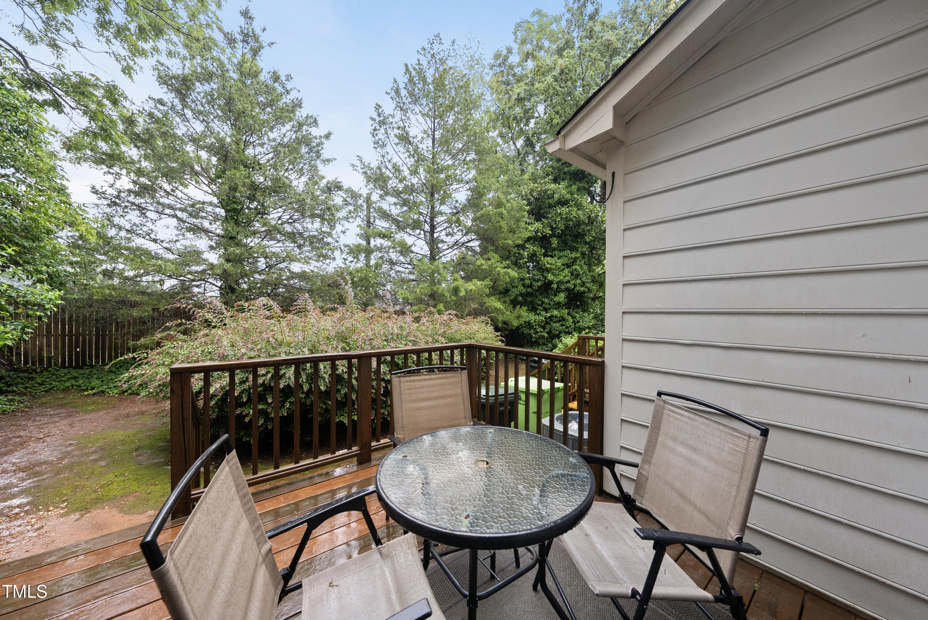 1403 Governors Court Raleigh, NC 27604 - Photo 9 of 34 a view of balcony with wooden floor and outdoor seating