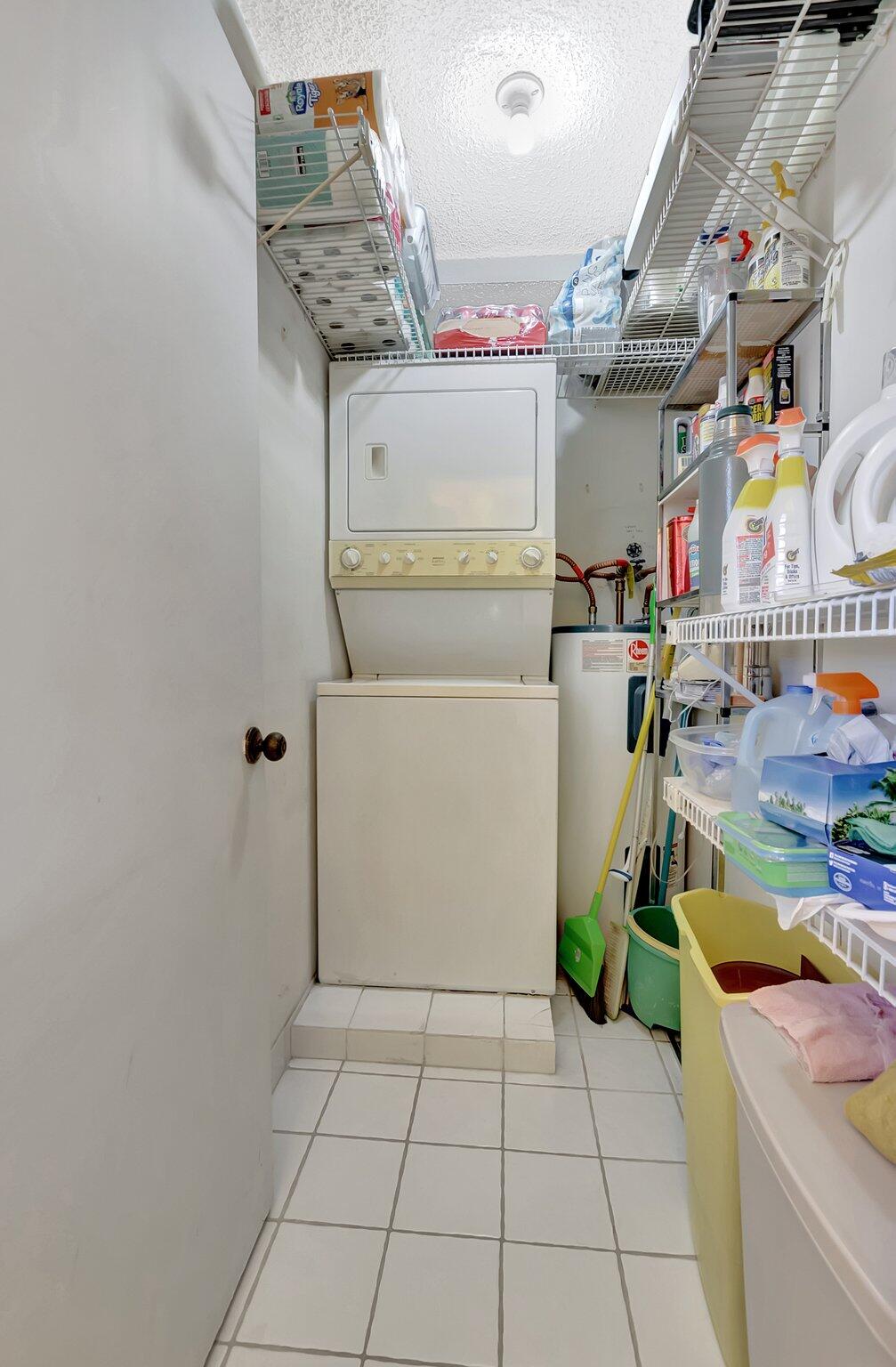 6699 Northwest 2nd Avenue, Unit 410 Boca Raton, FL 33487 - Photo 12 of 29 a utility room with dryer and washer