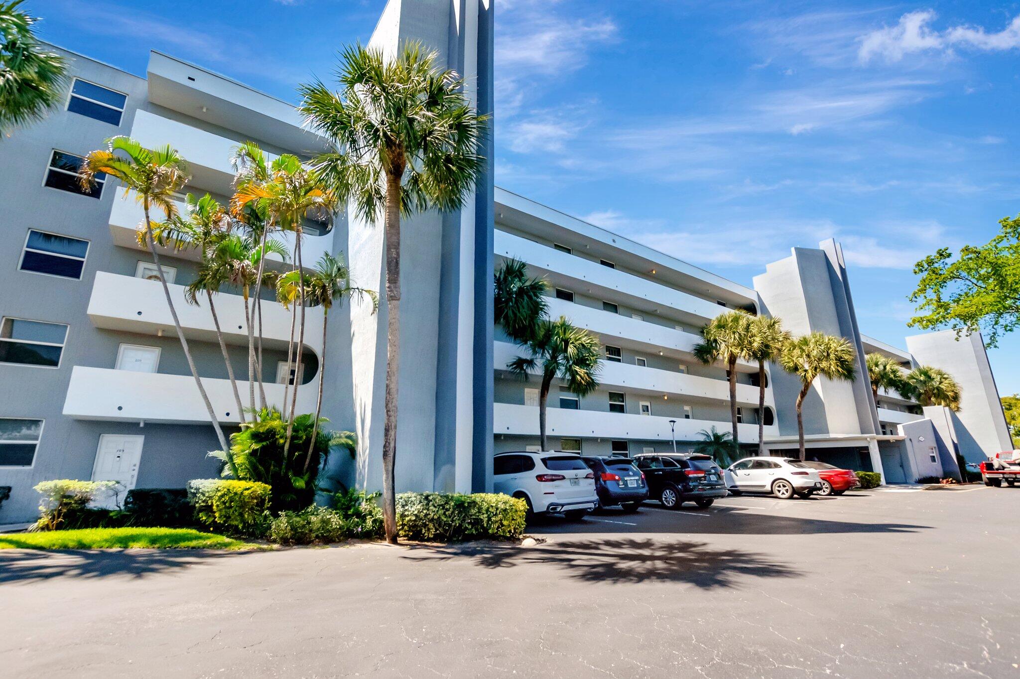6699 Northwest 2nd Avenue, Unit 410 Boca Raton, FL 33487 - Photo 27 of 29 a view of street with tall buildings