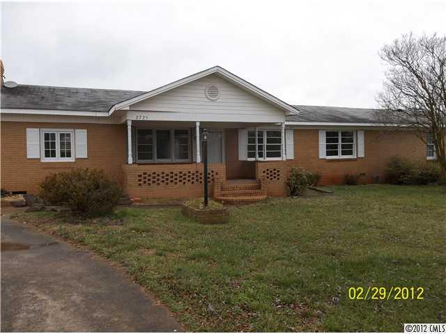 2725 Philadelphia Road Lawndale, NC 28090 - Photo 1 of 1 a view of a house with a yard