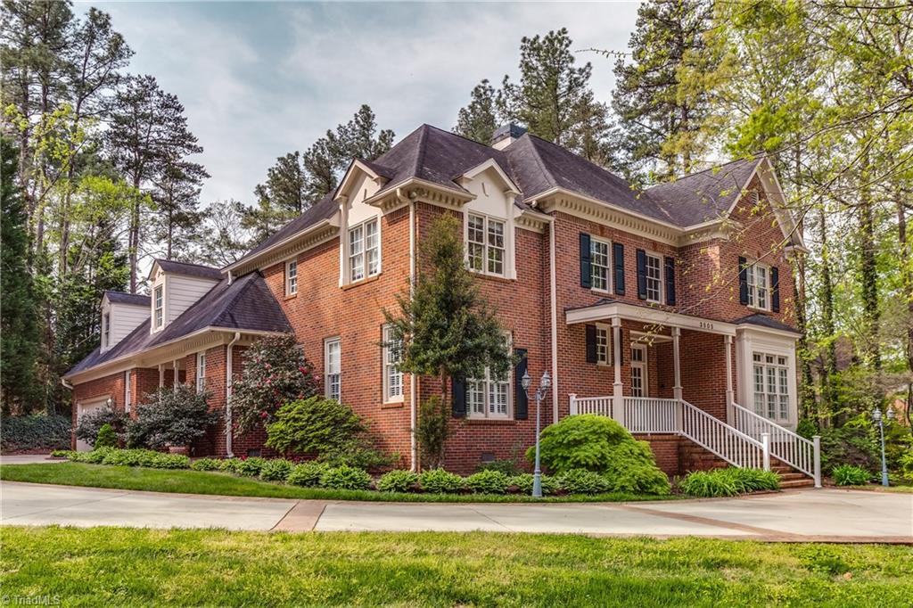 3605 Gaston Road Greensboro, NC 27407 - Photo 2 of 30 This stately home has front and side covered porches, side-entry garage, as well as a circular drive.