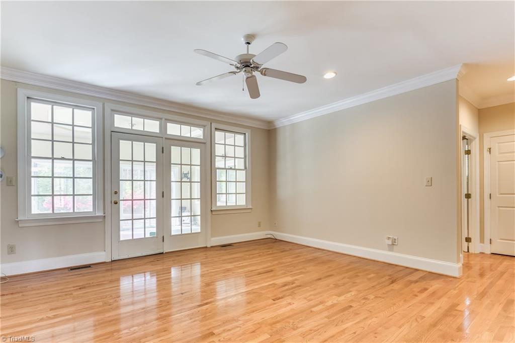 3605 Gaston Road Greensboro, NC 27407 - Photo 15 of 30 Main level Master Bedroom w/access to Sunroom overlooking gorgeous backyard area.