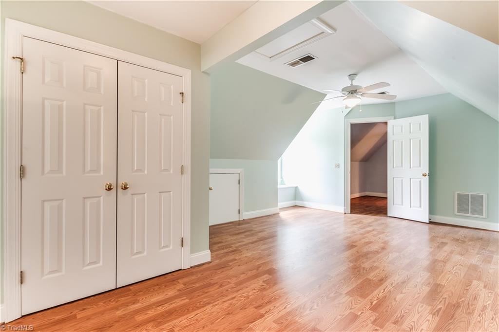 3605 Gaston Road Greensboro, NC 27407 - Photo 19 of 30 One of FOUR second level Bedrooms. New laminate wood flooring throughout second level.