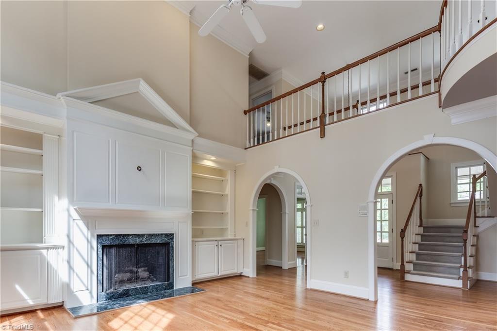 3605 Gaston Road Greensboro, NC 27407 - Photo 4 of 30 Great Room w/built-ins, gas log fireplace, gorgeous moldings and much more.