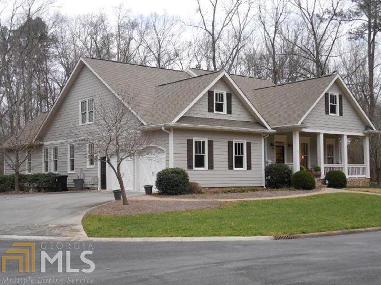 2 Ridge Creek Court Southwest Rome, GA 30165 - Photo 1 of 1 a front view of a house with a yard