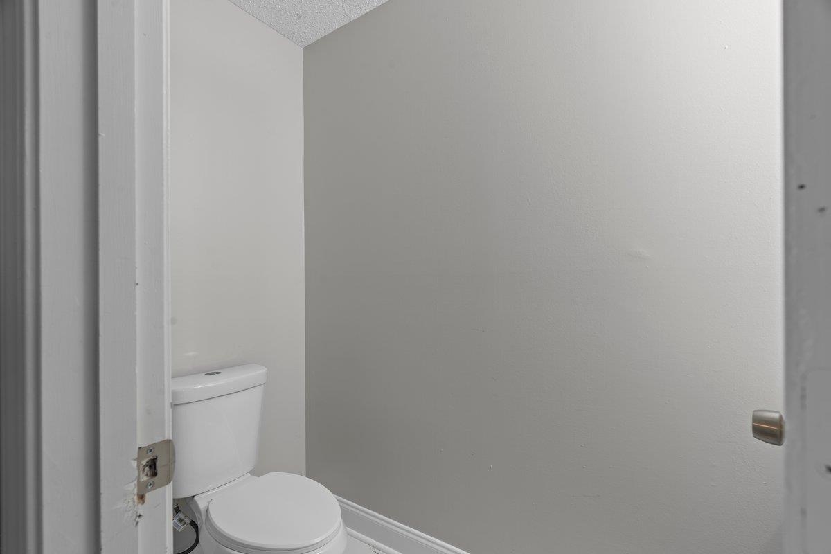 6010 Fox Ridge Drive Memphis, TN 38115 - Photo 29 of 34 Bathroom featuring toilet and baseboards