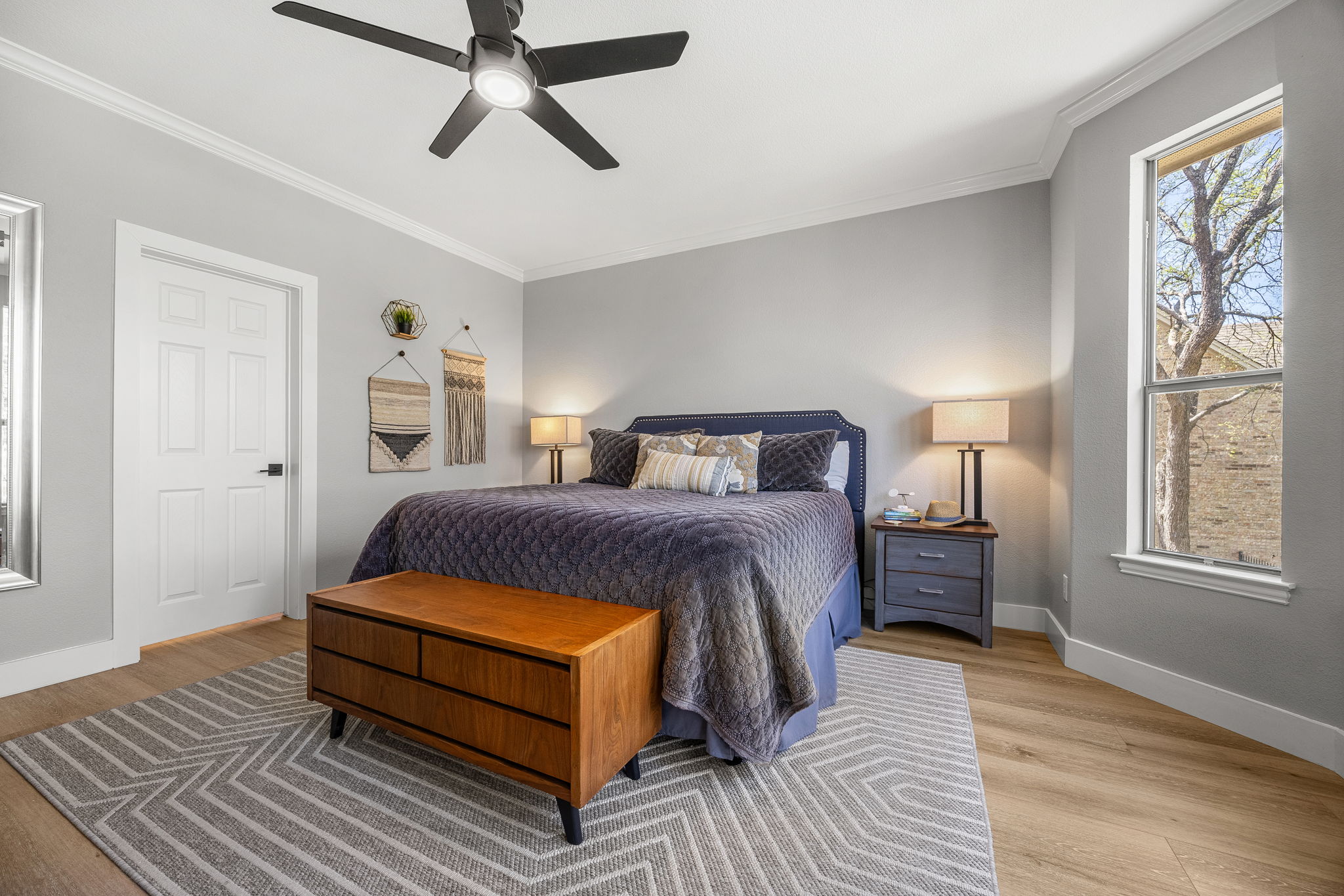 128 Las Colinas Drive Georgetown, TX 78628 - Photo 16 of 38 a bedroom with a bed lamp and a window