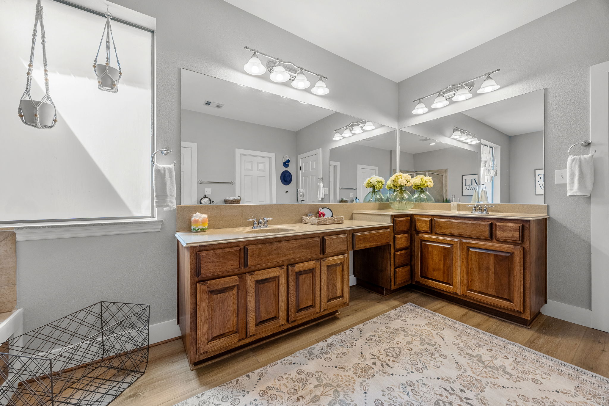 128 Las Colinas Drive Georgetown, TX 78628 - Photo 18 of 38 a spacious bathroom with a granite countertop double vanity sink and a mirror