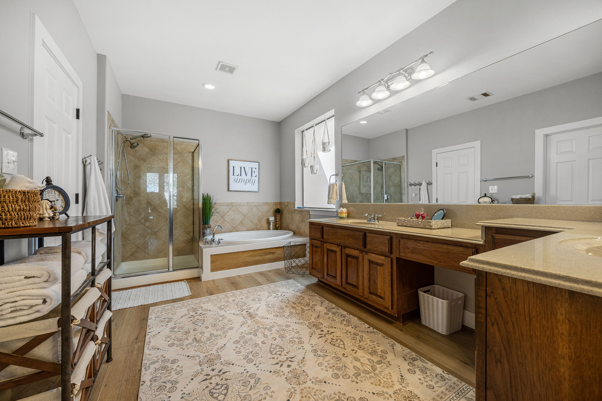 128 Las Colinas Drive Georgetown, TX 78628 - Photo 19 of 38 a large bathroom with a large tub and sink
