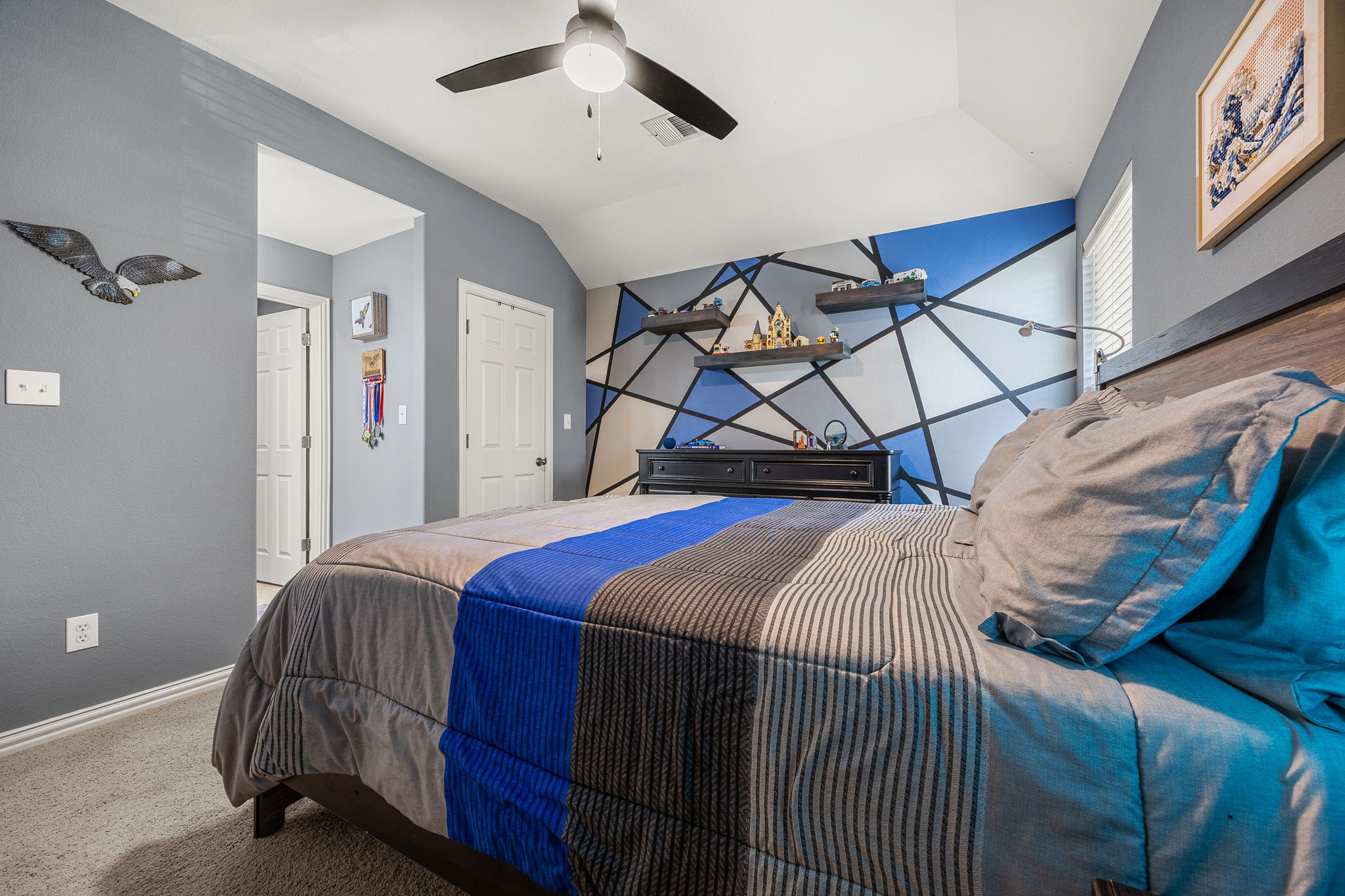 128 Las Colinas Drive Georgetown, TX 78628 - Photo 25 of 38 a bed sitting in a bedroom next to a window