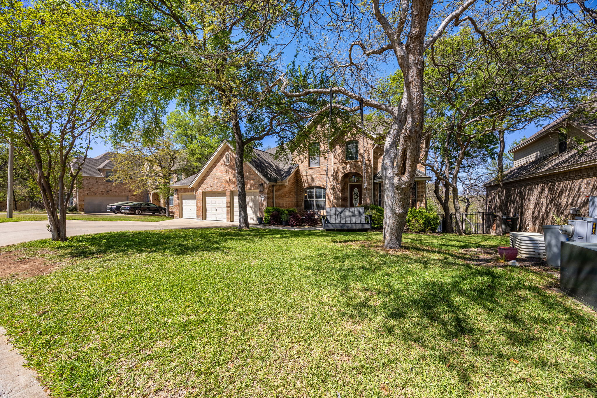 128 Las Colinas Drive Georgetown, TX 78628 - Photo 32 of 38 a house with trees in front of it