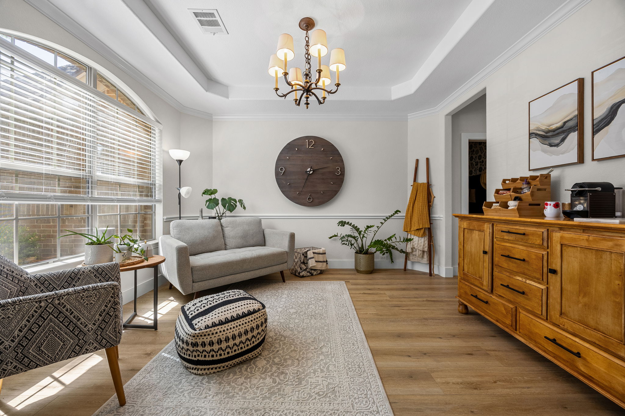 128 Las Colinas Drive Georgetown, TX 78628 - Photo 5 of 38 a living room with furniture a chandelier and a window