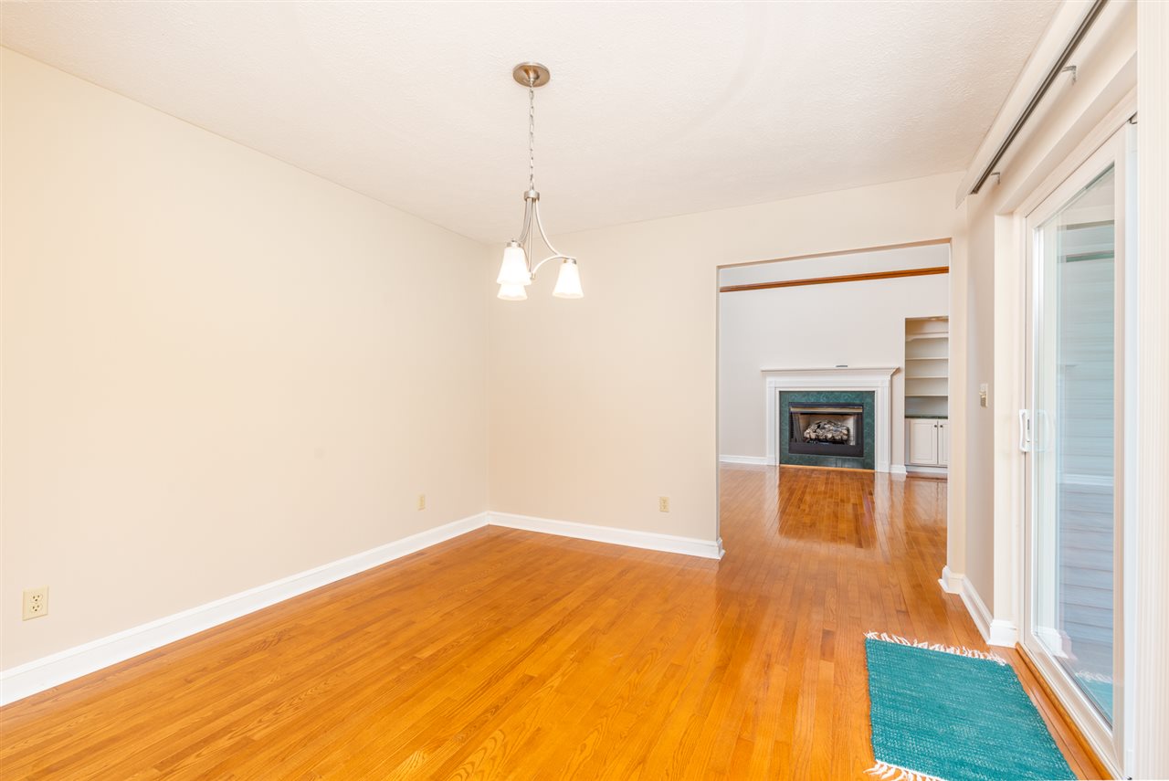 285 Fadley Road Weyers Cave, VA 24486 - Photo 12 of 30 a view of empty room with wooden floor and fan