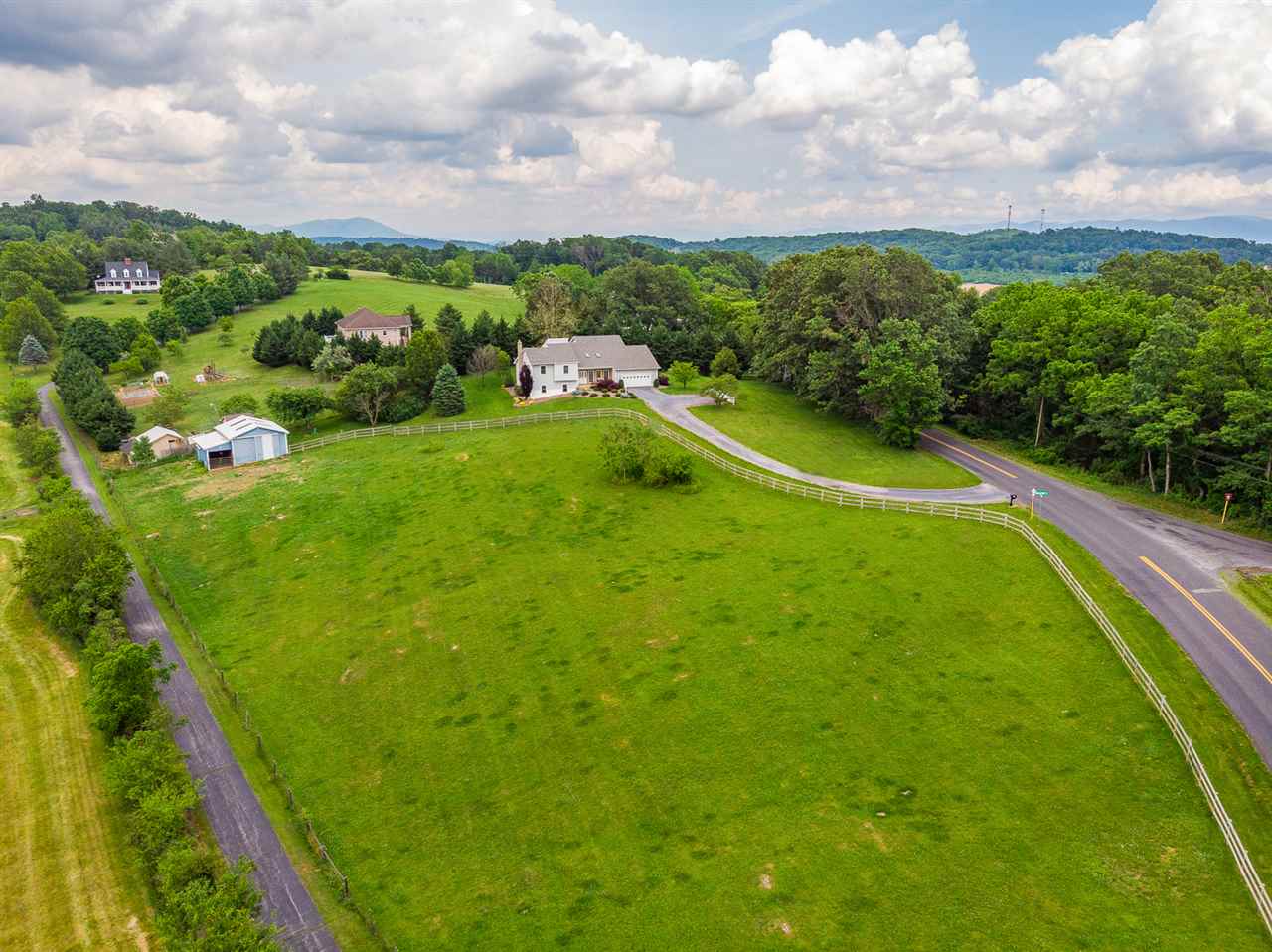 285 Fadley Road Weyers Cave, VA 24486 - Photo 29 of 30 a view of a green yard with houses