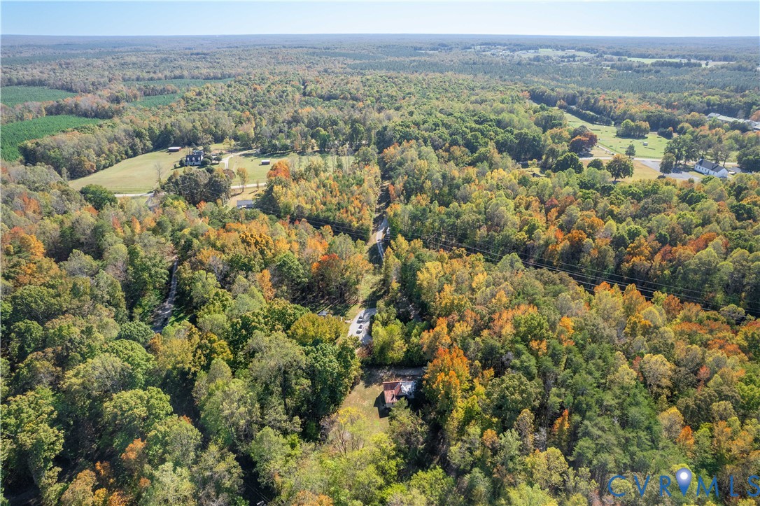 5636 Cartersville Road Powhatan, VA 23139 - Photo 26 of 32 an aerial view of residential houses with outdoor space and trees