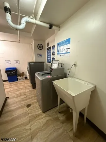 a view of a terrace with two chairs and a table