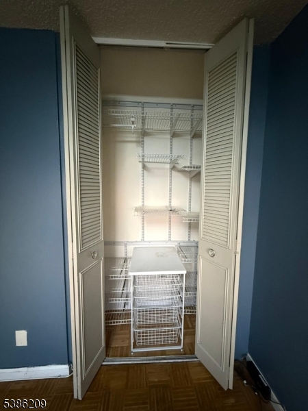 277 Prospect Avenue, Unit H Hackensack, NJ 07601 - Photo 8 of 25 a view of empty room with windows