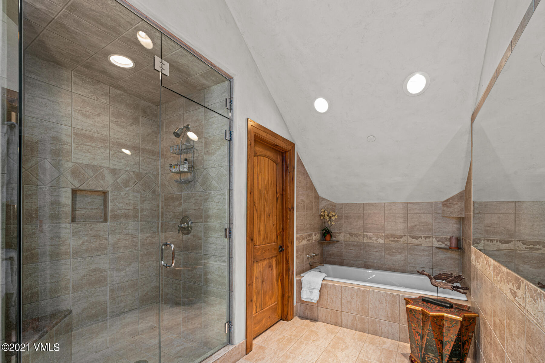 160 Cresta Road, Unit R501 Edwards, CO 81632 - Photo 16 of 21 a bathroom with a bathtub and shower