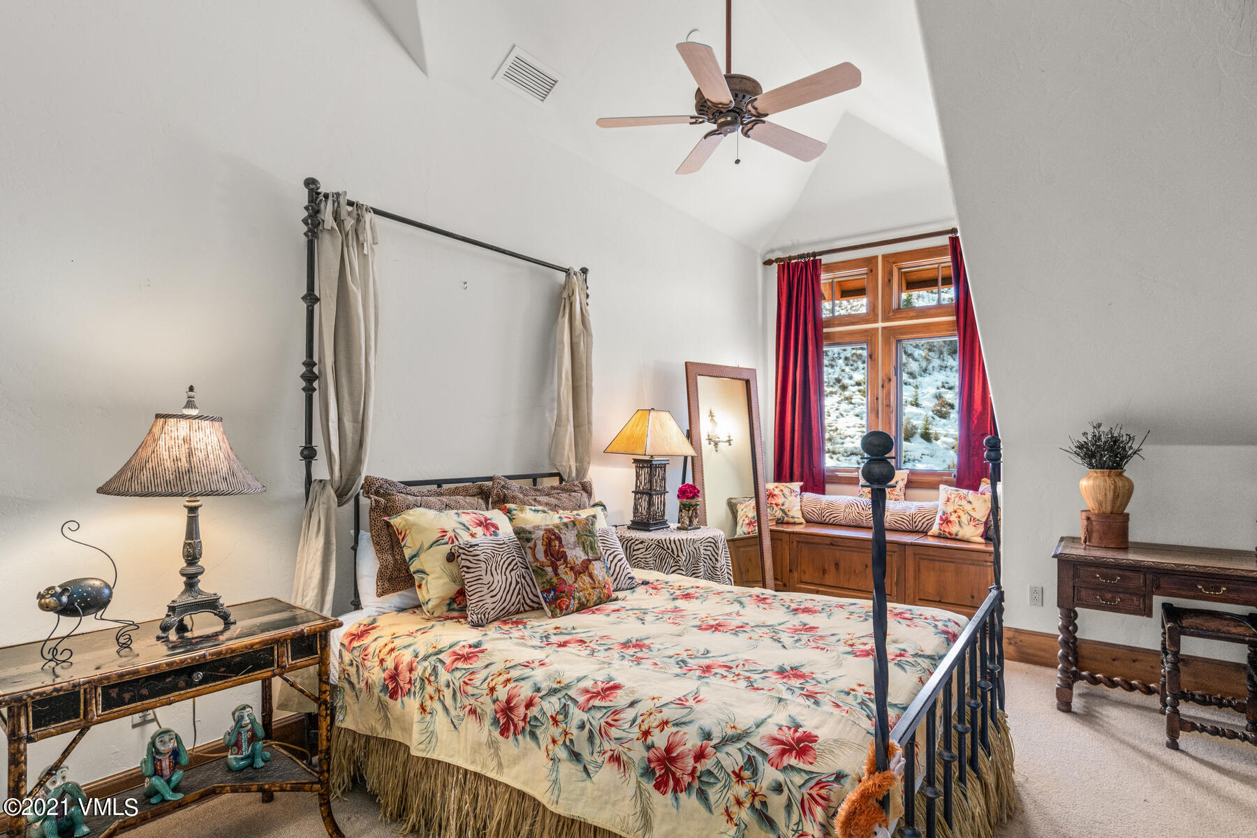 160 Cresta Road, Unit R501 Edwards, CO 81632 - Photo 17 of 21 a bedroom with a bed and a table in it