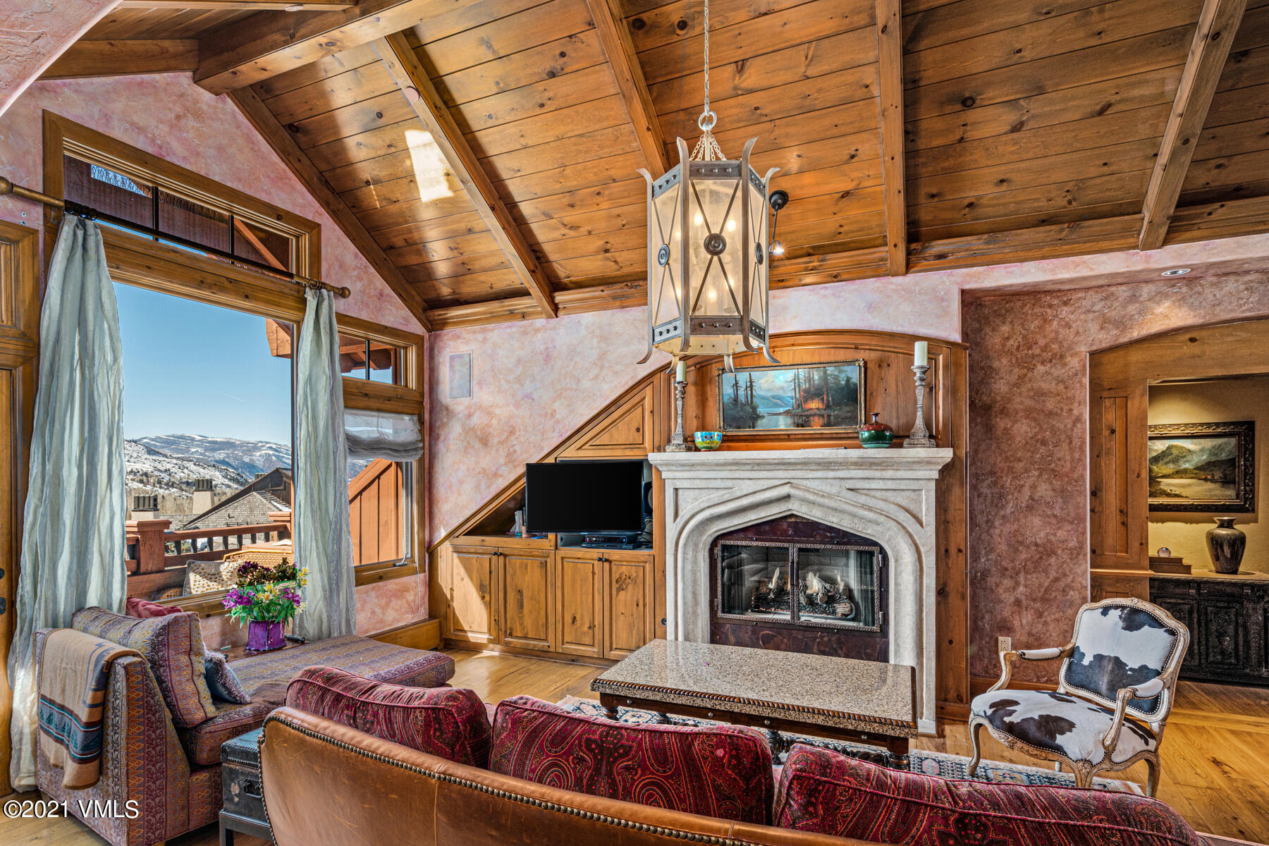 160 Cresta Road, Unit R501 Edwards, CO 81632 - Photo 4 of 21 a living room with furniture and a fireplace