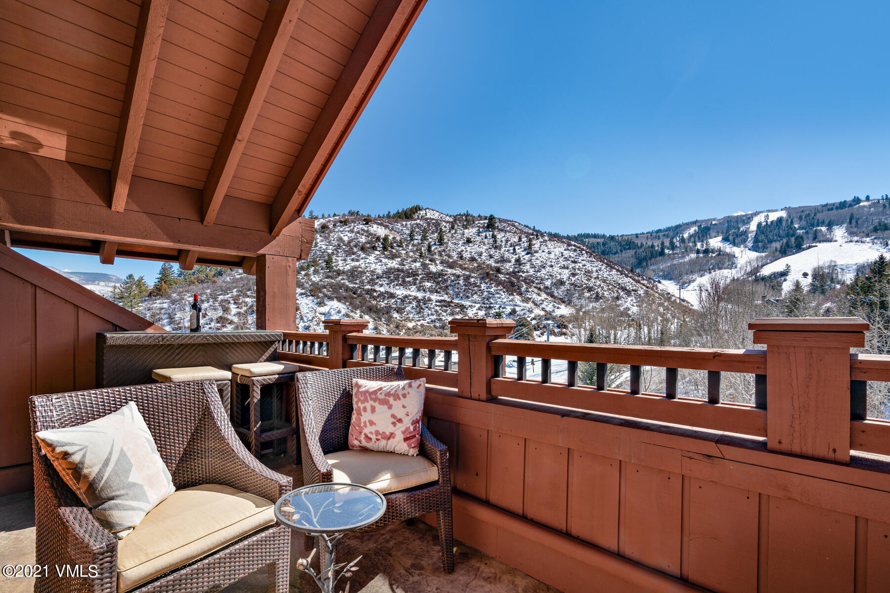 160 Cresta Road, Unit R501 Edwards, CO 81632 - Photo 9 of 21 a roof deck with couches and wooden floor