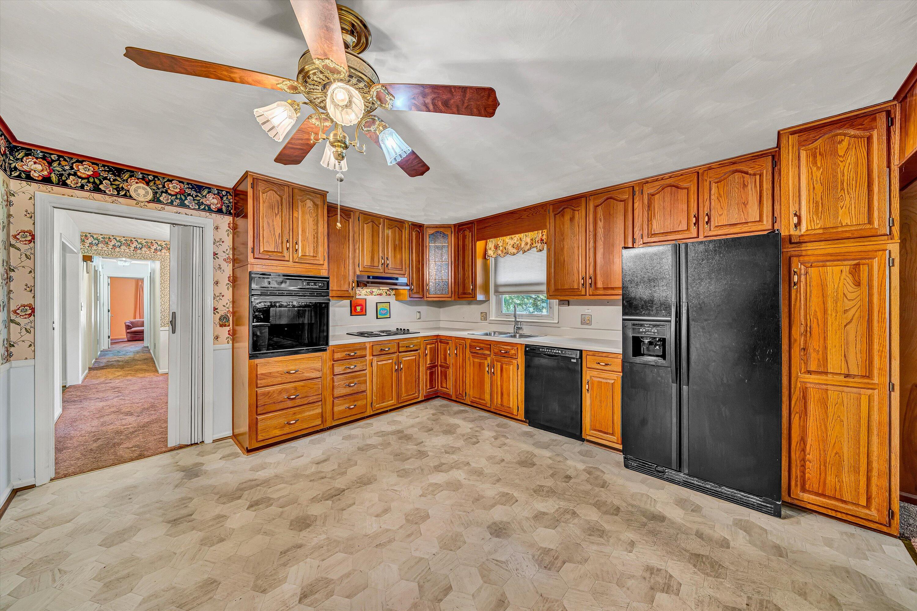 5226 North Spring Drive Northwest Roanoke, VA 24019 - Photo 13 of 46 a kitchen with stainless steel appliances granite countertop a refrigerator and a sink