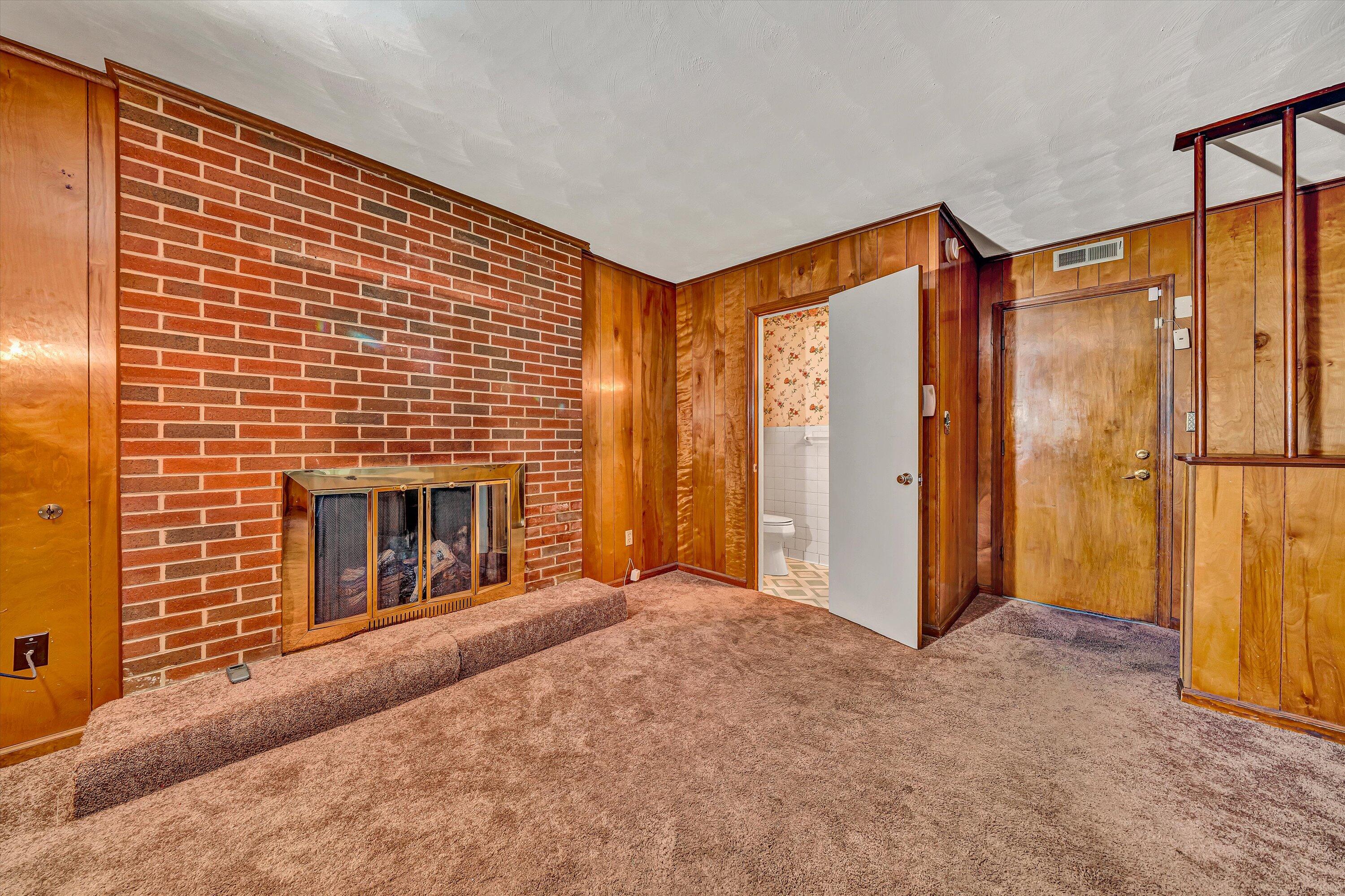 5226 North Spring Drive Northwest Roanoke, VA 24019 - Photo 29 of 46 a view of livingroom with an empty space and fire place