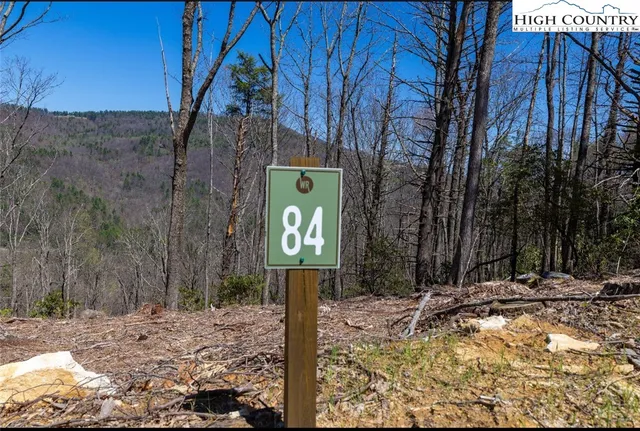 a sign board on the side of a road