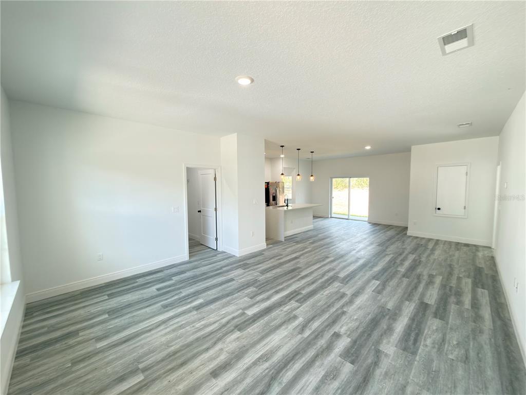 3901 Southwest 161st Loop Ocala, FL 34473 - Photo 3 of 47 a view of empty room with wooden floor