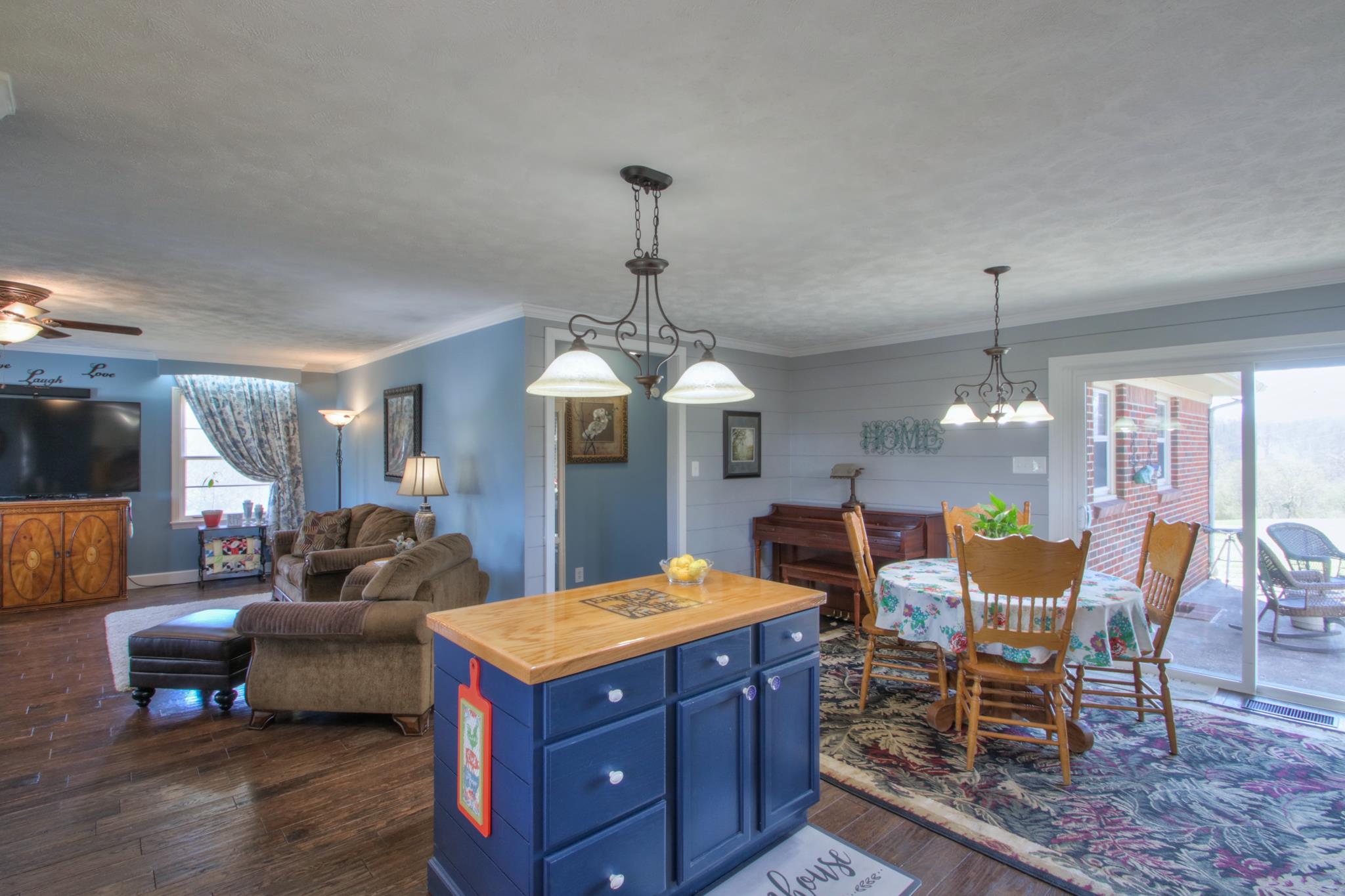 258 Cedar Park Road Centerville, TN 37033 - Photo 13 of 30 Open concept view from kitchen into dining and living room.