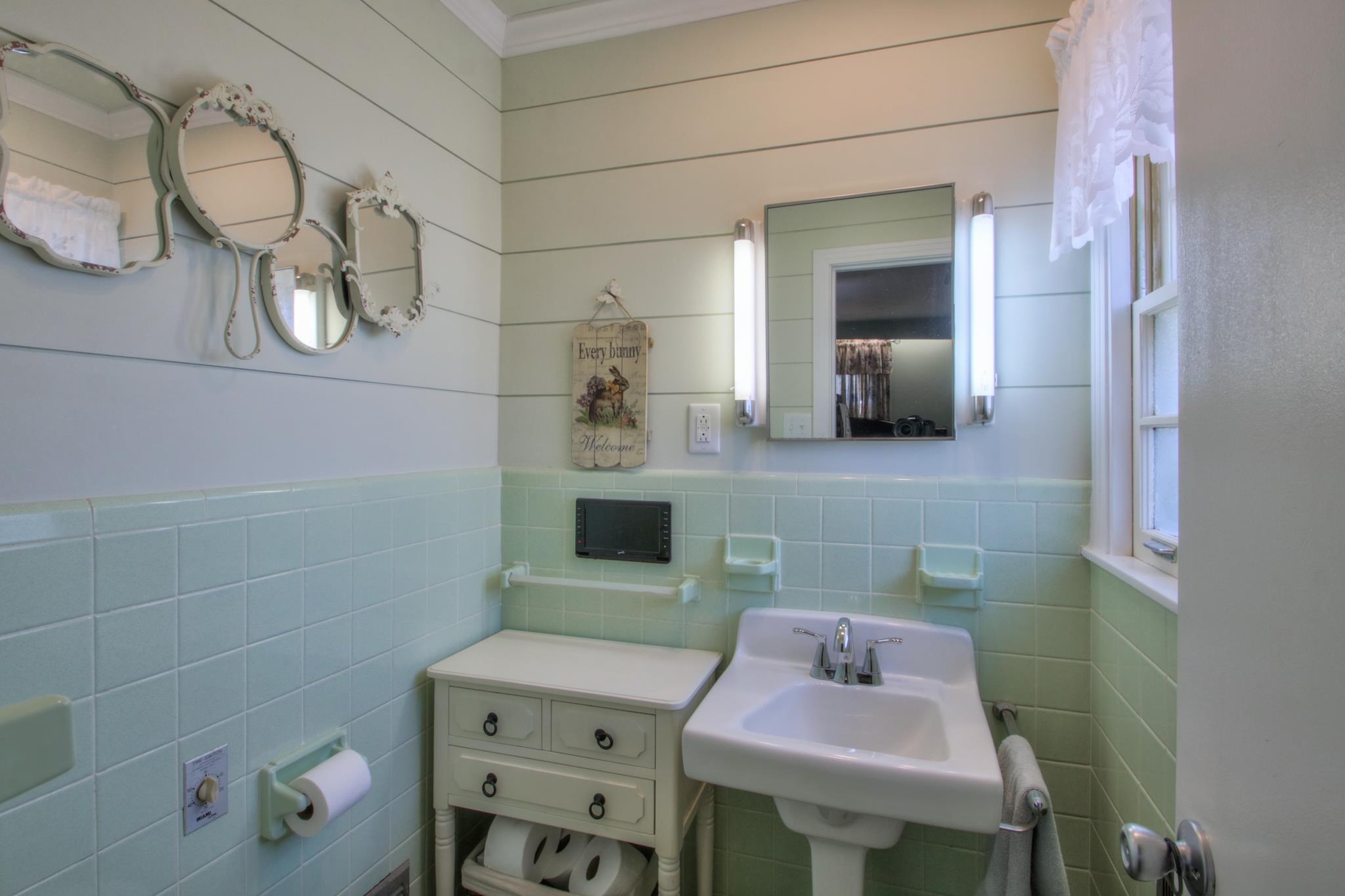 258 Cedar Park Road Centerville, TN 37033 - Photo 23 of 30 Gorgeous ship lap with built in tv to watch the news while you are getting ready.