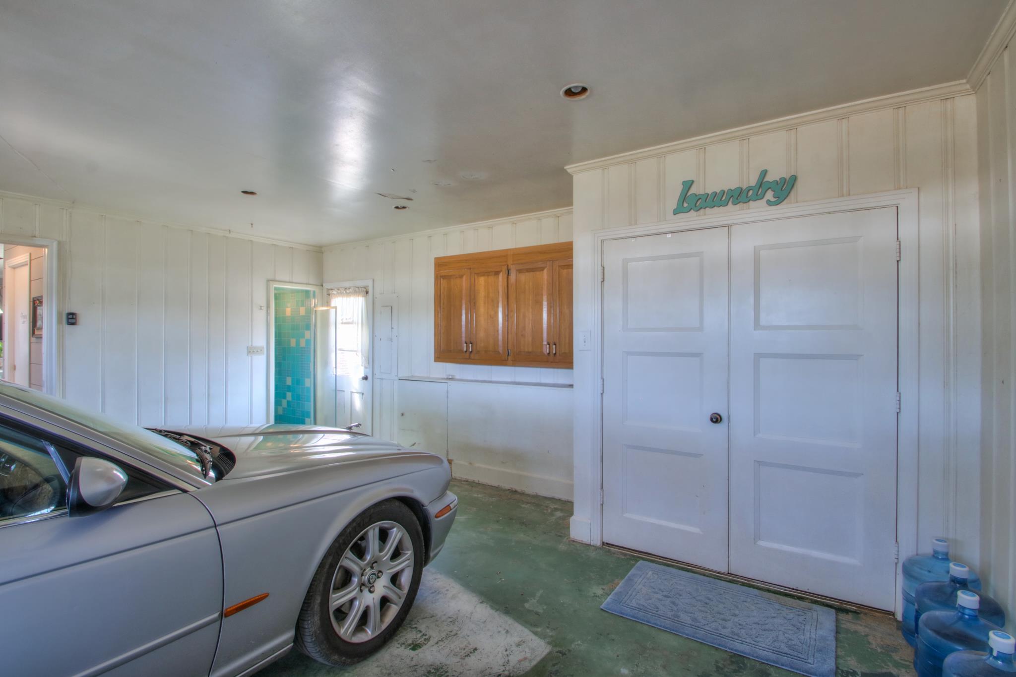 258 Cedar Park Road Centerville, TN 37033 - Photo 24 of 30 Laundry and flex space with extra shower for guests in the first garage. It does have heating and air-conditioning.
