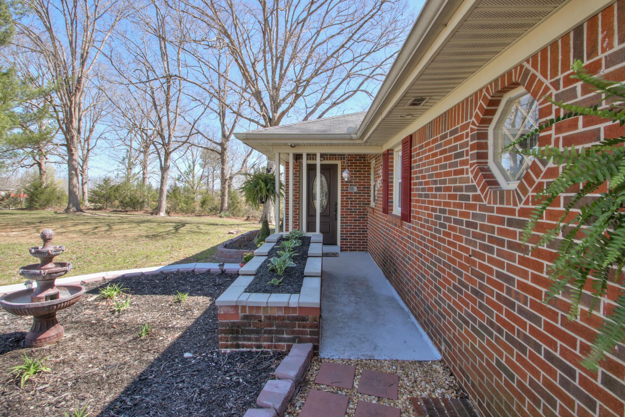 258 Cedar Park Road Centerville, TN 37033 - Photo 3 of 30 New shutters and planter box.