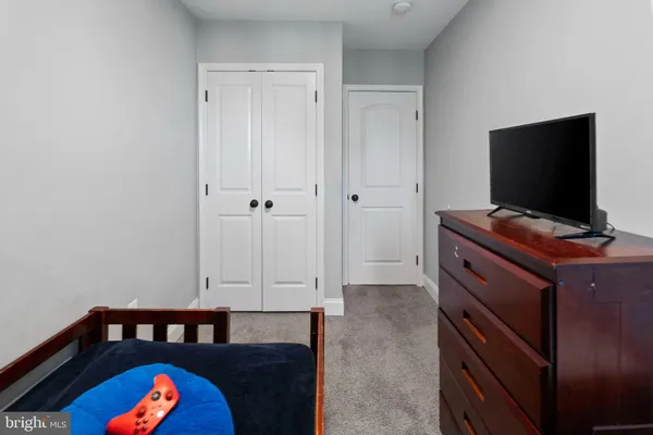 a view of workspace with flat screen tv