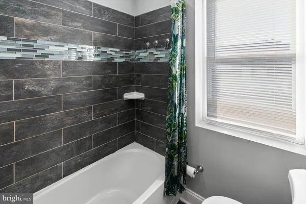 a bathroom with a bathtub