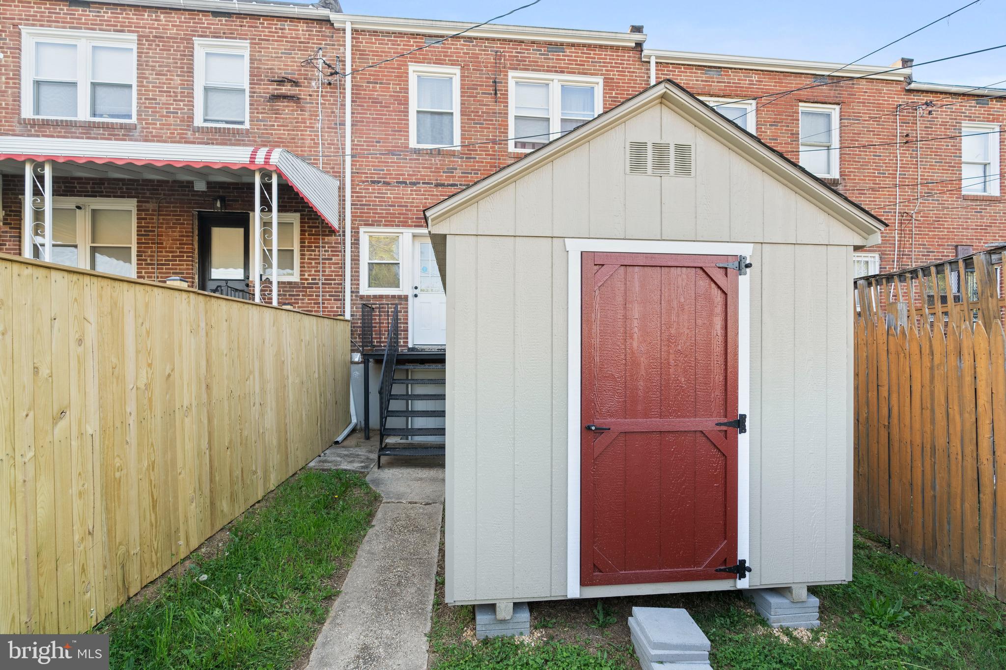 4237 Flowerton Road Baltimore, MD 21229 - Photo 27 of 27 a view of a house with wooden fence