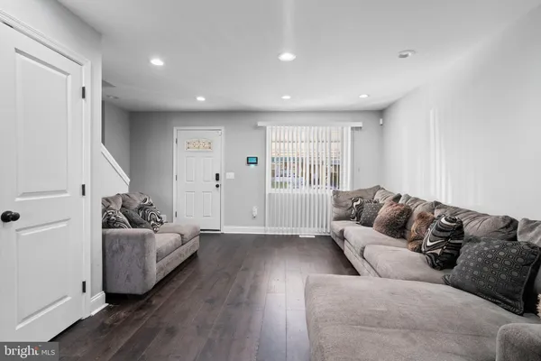 a living room with furniture and a couch