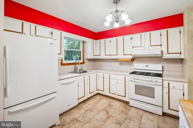 an entryway with chandelier