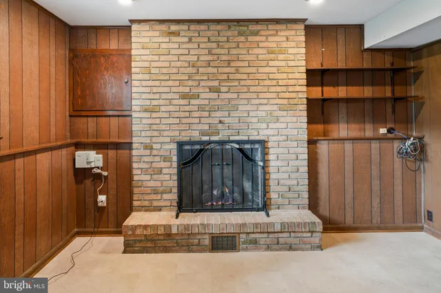 a view of an entryway with wooden walls