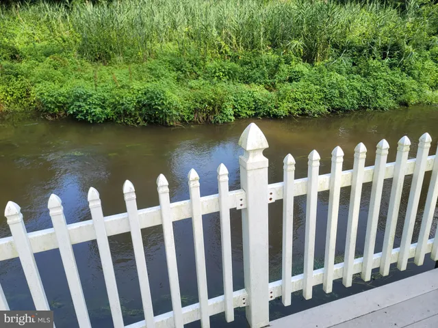 a picture of a wall with a white wall and a picture