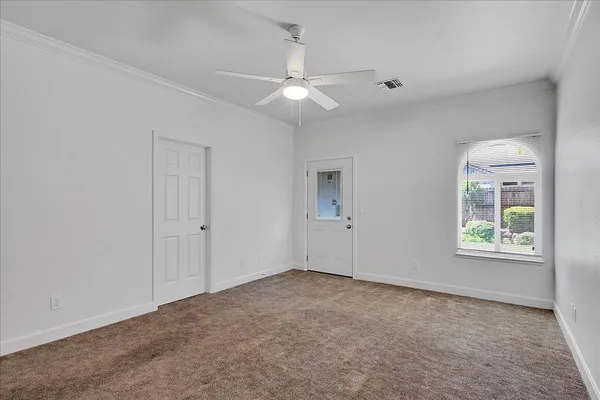 a bathroom with a tub mirror and sink