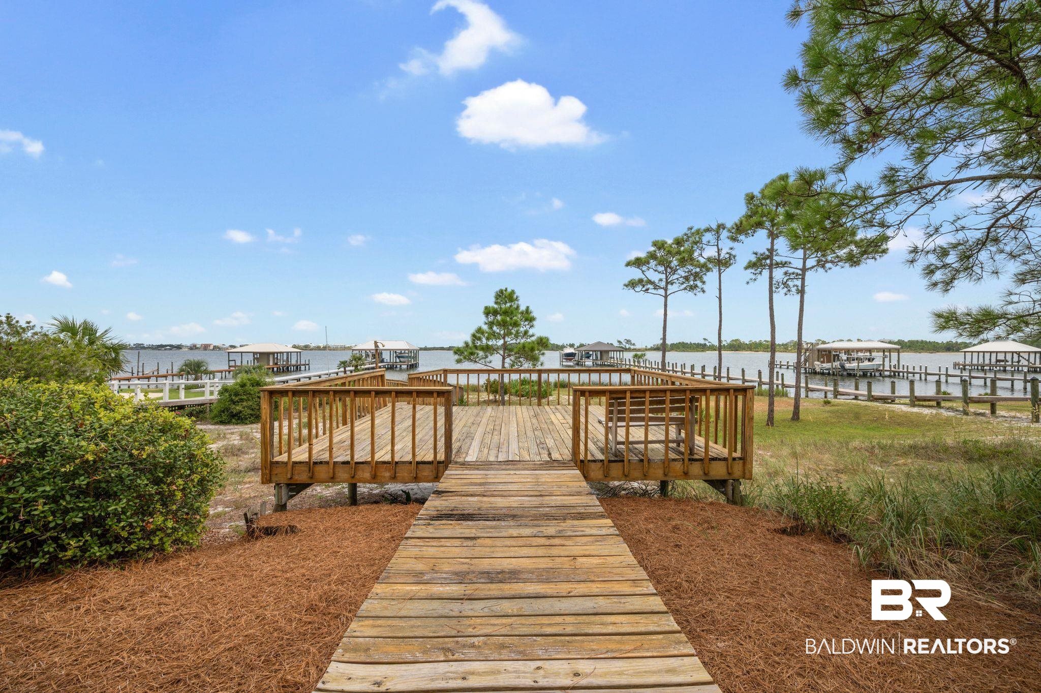31800 River Road Orange Beach, AL 36561 - Photo 54 of 69 View of dock featuring a water view