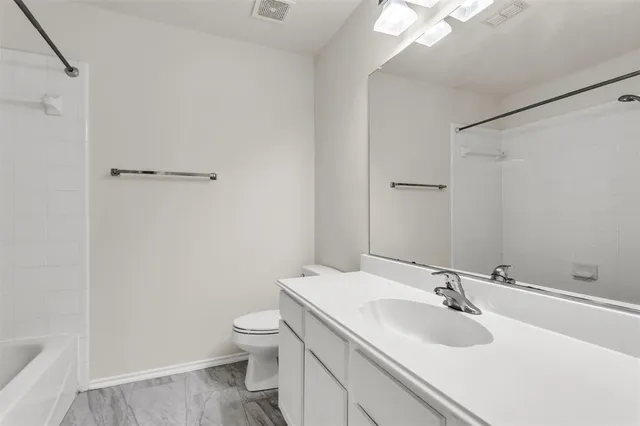 a view of a chandelier in big room