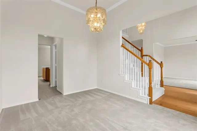 front view of a house with a large yard