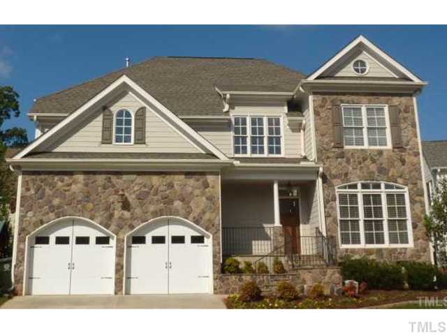 3706 Congeniality Way Raleigh, NC 27613 - Photo 1 of 10 a front view of a house with a yard