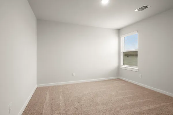 an empty room with a window